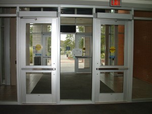 Interior entry doors for the library. There are 2 doors separated by a 3 foot pane of glass.