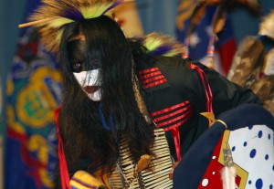 Indian custom performs a story in dance on stage during the Native American Indian Heritage Celebration in Alexander Hall, at Fort Gordon, Georgia (GA), 