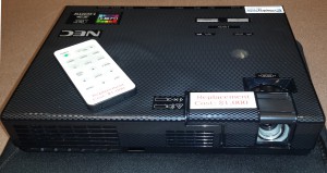 front of LED projector with remote control