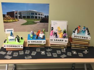 origami penguins at various stages of learning at Clark