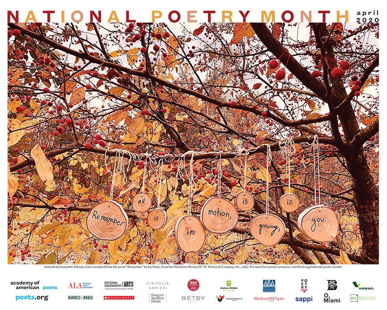 A tree with orange and red fall leaves has thin discs of a tree truck hanging from one branch. Each disk has a word and altogether reads: Remember all is in motion, is growing, is you. The words National Library Month are across the top, and various sponsor logos line the base.