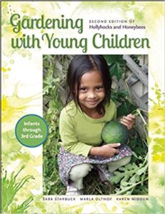 Book cover showing a child in a garden