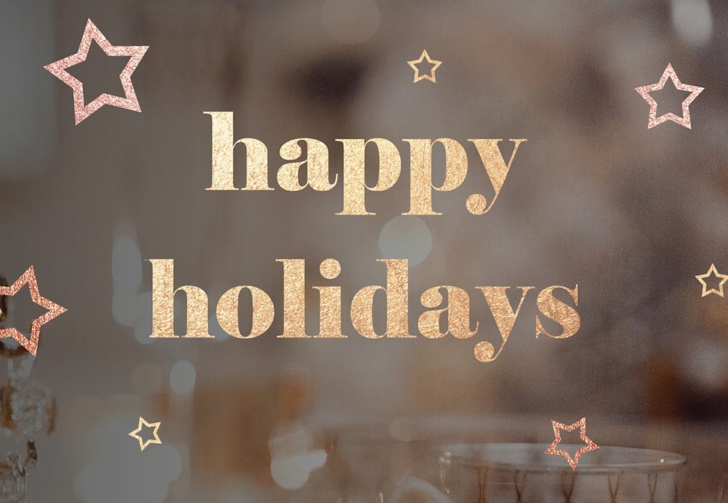 gold text reads "happy holidays" surrounded by stars
