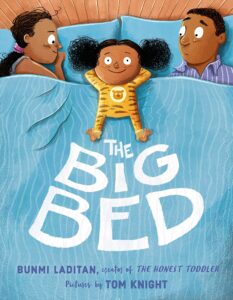 Cover of The Big Bed showing a Black mother, daughter, and father in bed