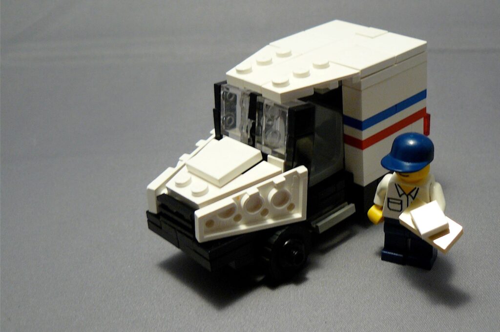 lego postal worker and postal truck