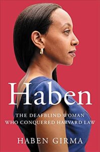 Book cover of Girma's book with a portrait of her in profile, wearing a blue dress on a red background