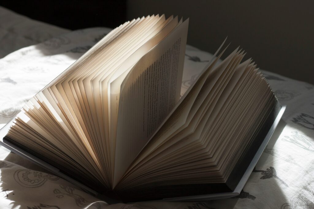 Featured photo, a book with it's pages open by Melanie THESE on Unsplash