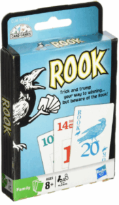 A small box containing the card game Rook and depicting a raven holding cards